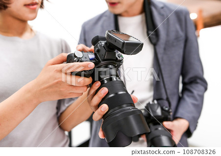 Shooting in a studio with a photographer 108708326