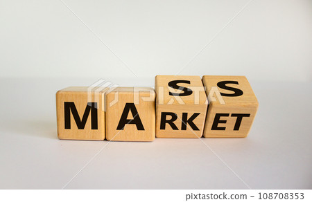 Mass market symbol. Turned wooden cubes with words 'mass market'. Beautiful white background, copy space. Business and mass market concept. 108708353