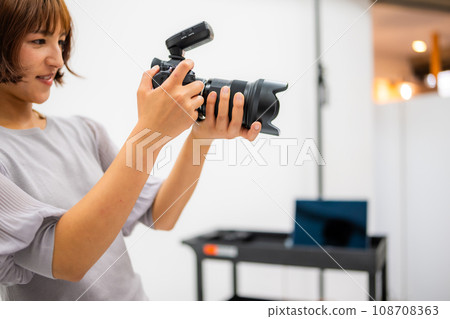 Shooting in a studio with a photographer Shooting in a studio with a photographer 108708363
