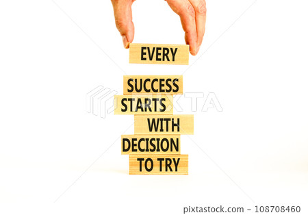 Success symbol. Concept words Every success starts with decision to try on wooden block. Beautiful white table background. Businessman hand. Business success and decision to try concept. Copy space. 108708460
