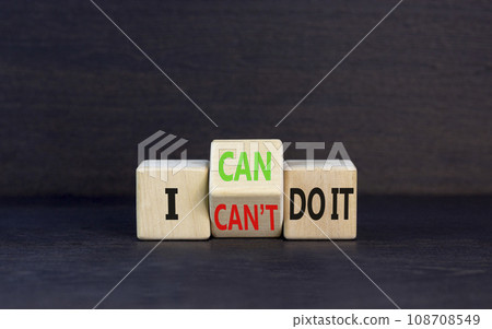 I can do it symbol. Concept word I can or can not do it on beautiful wooden cubes. Beautiful black table black background. Business and i can or not do it concept. Copy space. 108708549