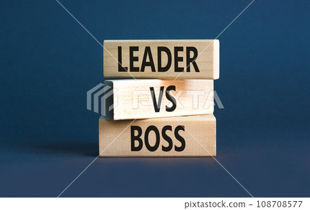 Boss vs leader symbol. Concept words Boss vs versus leader on wooden block. Beautiful grey table grey background. Business motivational boss vs leader concept. Copy space. Boss vs leader symbol. Concept words Boss vs versus leader on wooden block. Beautiful grey table grey background. Business motivational boss vs leader concept. Copy space. 108708577