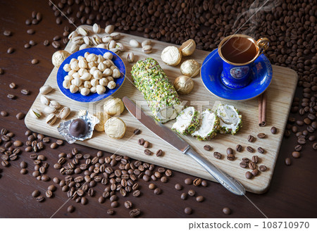 Sweets on the background of coffee on the table 108710970