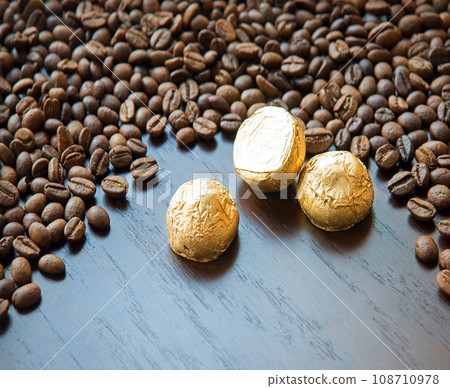 Sweets on the background of coffee on the table Sweets on the background of coffee on the table 108710978