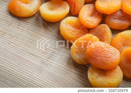 Dried fruits on a wooden table Dried fruits on a wooden table 108710979