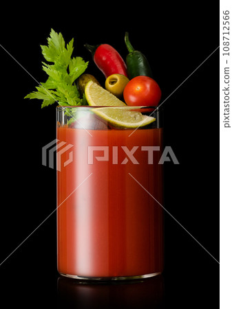 Bloody mary original classic,vodka and tomato juice cocktail on black. Bloody mary original classic,vodka and tomato juice cocktail on black. 108712566