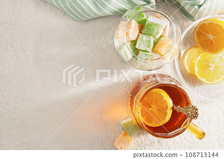 Oriental sweetness Turkish delight and tea with lemon 108713144
