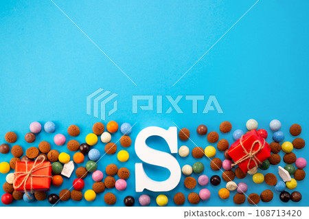 St.Nicholas day 5th of December, chocolate spicy ginger cookies and letter on blue background 108713420