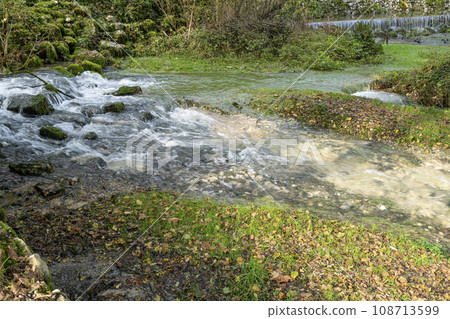 view of the source of the Serenissima in Polcenigo, Italy view of the source of the Serenissima in Polcenigo, Italy 108713599