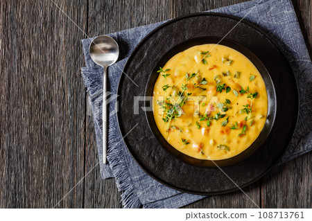Beer cheese soup with vegetables and thyme Beer cheese soup with vegetables and thyme 108713761