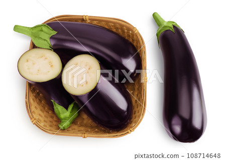 eggplant in a wicker basket isolated on white background with full depth of field. Top view. Flat lay eggplant in a wicker basket isolated on white background with full depth of field. Top view. Flat lay 108714648