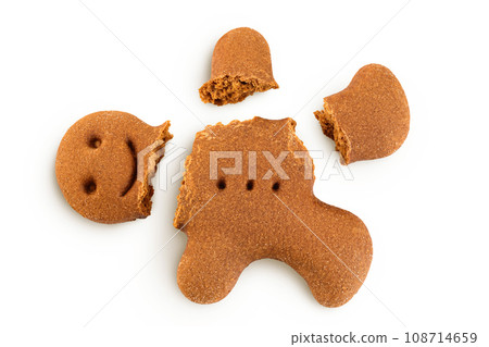 Gingerbread man isolated on white background. Top view. Flat lay. Gingerbread man isolated on white background. Top view. Flat lay. 108714659
