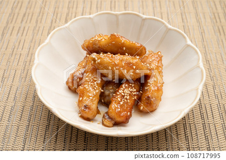 Homemade chicken wings boiled in sweet and spicy sauce Homemade chicken wings boiled in sweet and spicy sauce 108717995