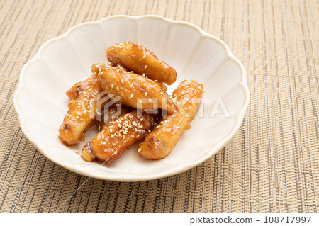 Homemade chicken wings boiled in sweet and spicy sauce Homemade chicken wings boiled in sweet and spicy sauce 108717997