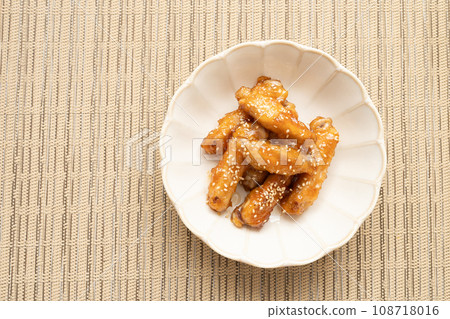 Homemade chicken wings boiled in sweet and spicy sauce Homemade chicken wings boiled in sweet and spicy sauce 108718016