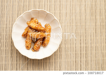 Homemade chicken wings boiled in sweet and spicy sauce Homemade chicken wings boiled in sweet and spicy sauce 108718017