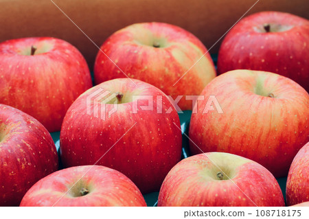 apples packed in a cardboard box 108718175