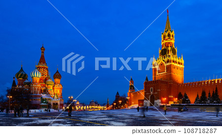 Spasskaya Tower and Saint Basils Cathedral on Red Square in Moscow on winter evening Spasskaya Tower and Saint Basils Cathedral on Red Square in Moscow on winter evening 108718287