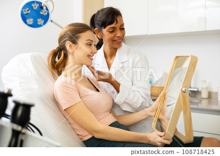 Woman having consultation at aesthetic medicine clinic Woman having consultation at aesthetic medicine clinic 108718425