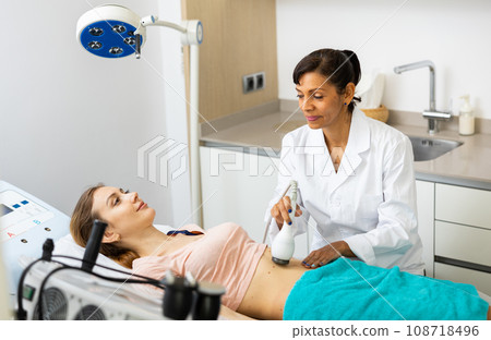 Woman having cavitation procedure Woman having cavitation procedure 108718496