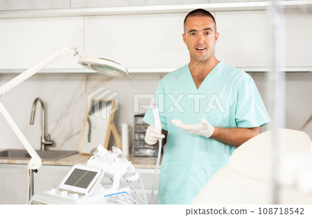 cosmetologist displays Hydrogen Oxygen Cleaner 108718542