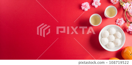 Tang Yuan(sweet dumplings balls), a traditional chinese cuisine for Mid-autumn, Dongzhi (winter solstice festival ) and Chinese new year. Tang Yuan(sweet dumplings balls), a traditional chinese cuisine for Mid-autumn, Dongzhi (winter solstice festival ) and Chinese new year. 108719522