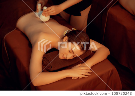 Hot herbal ball spa massage body treatment. Quiescent Hot herbal ball spa massage body treatment. Quiescent 108720248
