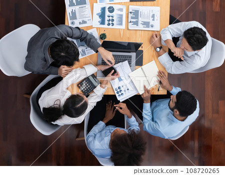 Top view multiracial analyst team use BI dashboard for data analysis. Concord Top view multiracial analyst team use BI dashboard for data analysis. Concord 108720265