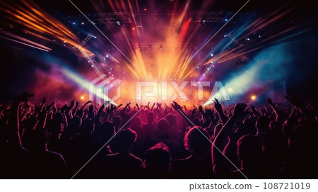 silhouette of concert crowd in front of bright stage lights silhouette of concert crowd in front of bright stage lights 108721019