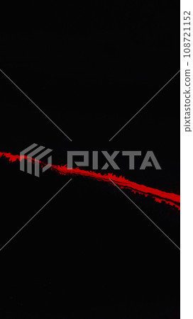 Red paint on black ink flow fluid splash drip dark 108721152