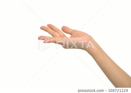 An elegant woman's hand extended forward, her fingertips gently curled as if to grasp something invisible, set against a spotless white background. An elegant woman's hand extended forward, her fingertips gently curled as if to grasp something invisible, set against a spotless white background. 108721229