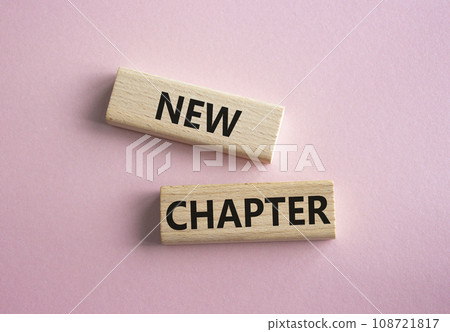 New Chapter symbol. Concept word New Chapter on wooden blocks. Beautiful pink background. Business and New Chapter concept. Copy space New Chapter symbol. Concept word New Chapter on wooden blocks. Beautiful pink background. Business and New Chapter concept. Copy space 108721817