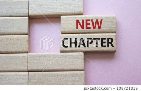 New Chapter symbol. Concept word New Chapter on wooden blocks. Beautiful pink background. Business and New Chapter concept. Copy space New Chapter symbol. Concept word New Chapter on wooden blocks. Beautiful pink background. Business and New Chapter concept. Copy space 108721819