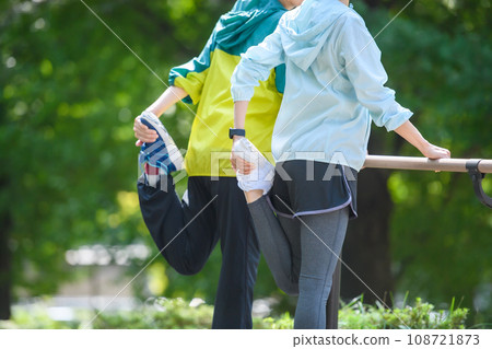 Stretching outdoors 108721873