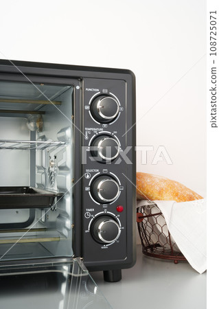 Close up of black mini electric oven home appliance 108725071