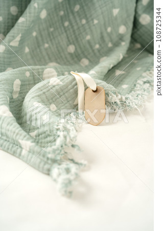 Muslin baby cotton blanket on white background Muslin baby cotton blanket on white background 108725344