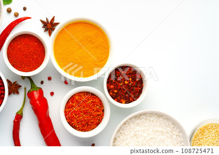 Beautiful composition with various spices on white background Beautiful composition with various spices on white background 108725471