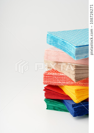 Stack of paper napkins on white background Stack of paper napkins on white background 108726271