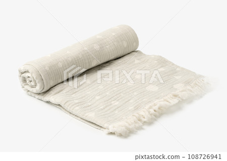 Gray muslin blanket for kids on white background Gray muslin blanket for kids on white background 108726941