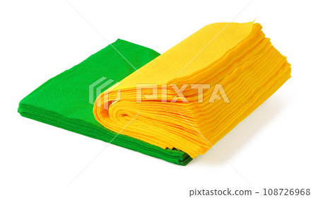 Green and yellow paper napkins on white background 108726968