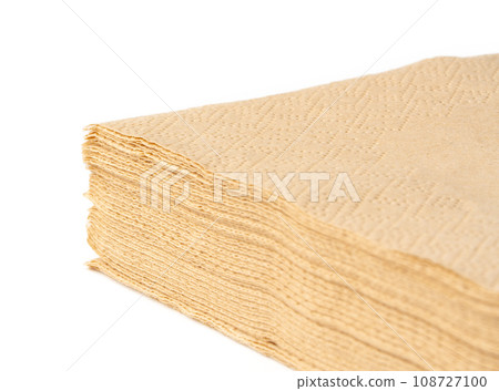 Beige paper napkins on white background studio shot Beige paper napkins on white background studio shot 108727100
