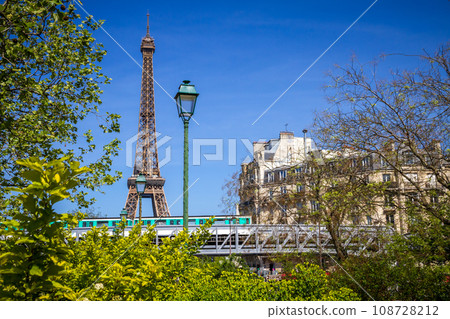 Eiffel Tower and subway on a bridge, Paris, France Eiffel Tower and subway on a bridge, Paris, France 108728212