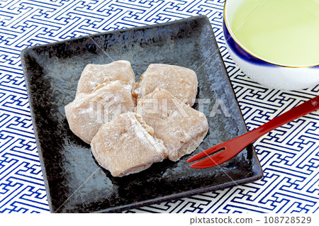 Walnut Yubeshi and Japanese tea on a plate Walnut Yubeshi and Japanese tea on a plate 108728529