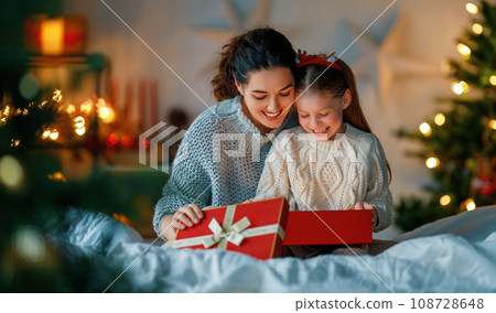 family celebrating Christmas family celebrating Christmas 108728648