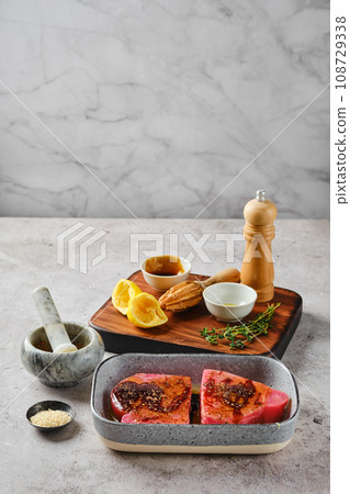 Marinated ahi tuna steak in a bowl Marinated ahi tuna steak in a bowl 108729338