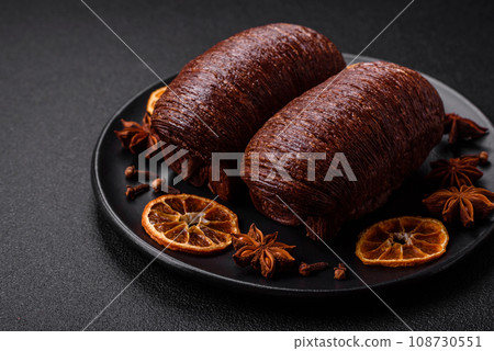 Delicious sweet crispy puff pastry with chocolate filling Delicious sweet crispy puff pastry with chocolate filling 108730551