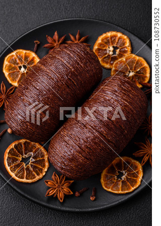 Delicious sweet crispy puff pastry with chocolate filling Delicious sweet crispy puff pastry with chocolate filling 108730552
