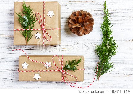 Christmas or New Year background, plain composition made of Xmas decorations and fir branches, flat lay 108731349