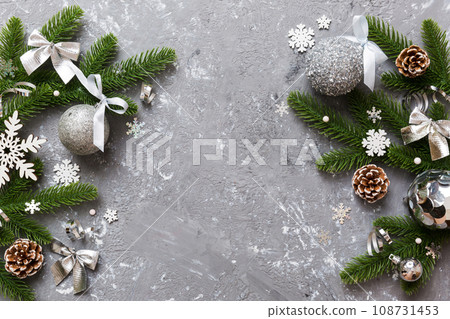 Christmas background with fir branches and Christmas decor. Top view, copy space for text Christmas background with fir branches and Christmas decor. Top view, copy space for text 108731453