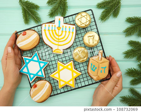 Celebrating Hanukkah. The concept of the Hanukkah holiday. Celebrating Hanukkah. The concept of the Hanukkah holiday. 108732069